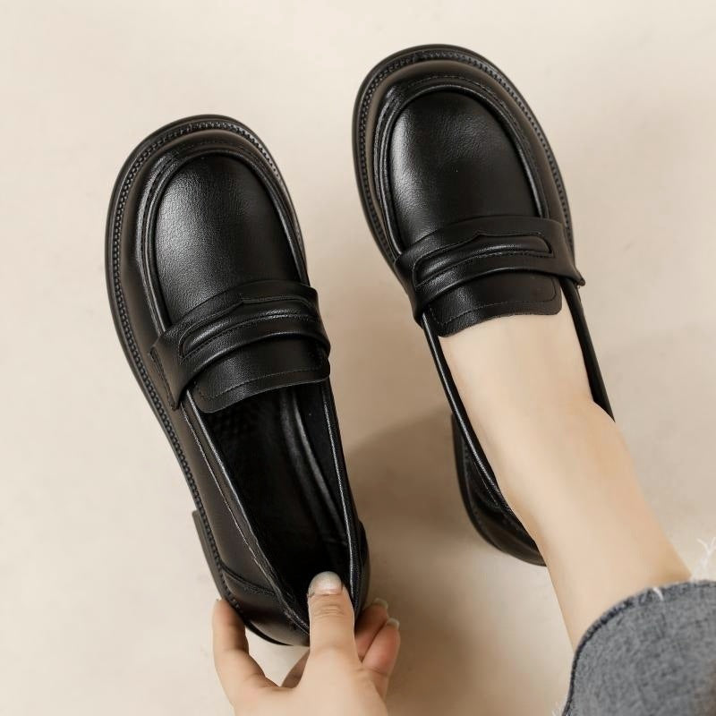 Chaussures en cuir noires pour femmes à bout rond et semelle épaisse