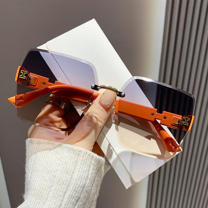 Lunettes de soleil carrées sans bords pour femmes